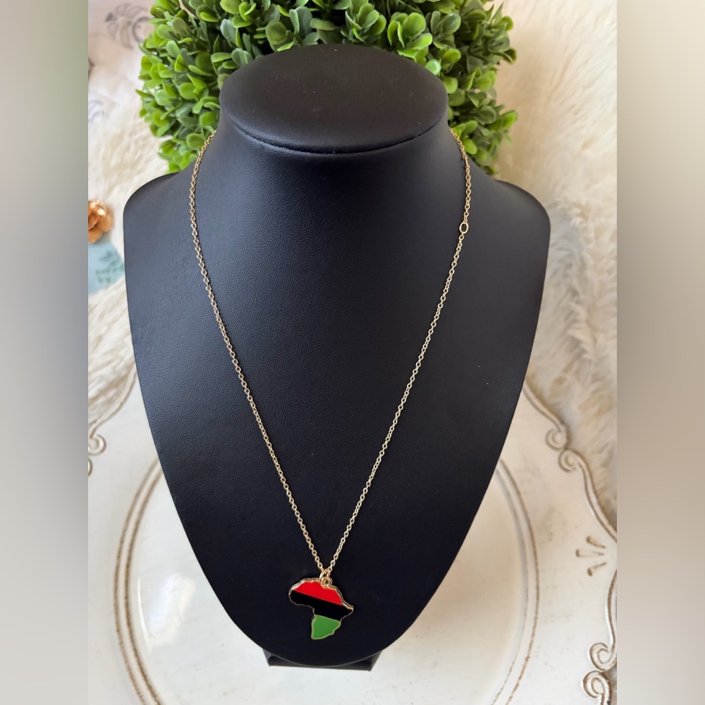 Explorer traditions Goldtone Necklace with Red and Green Africa Pendant new